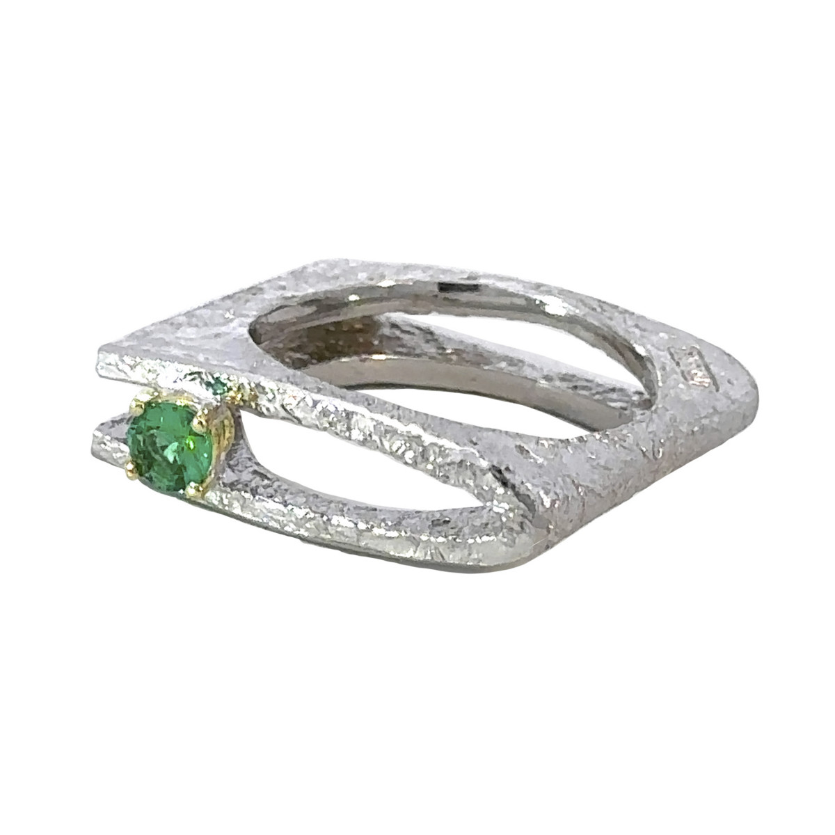 Silver, gold and emerald ring