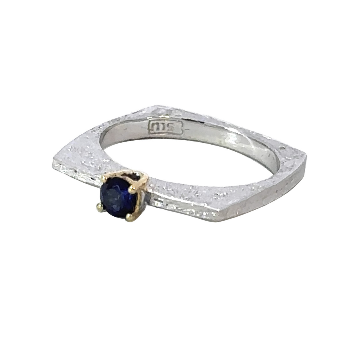 Silver, gold and topaz ring