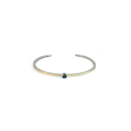 Silver, gold and topaz bracelet