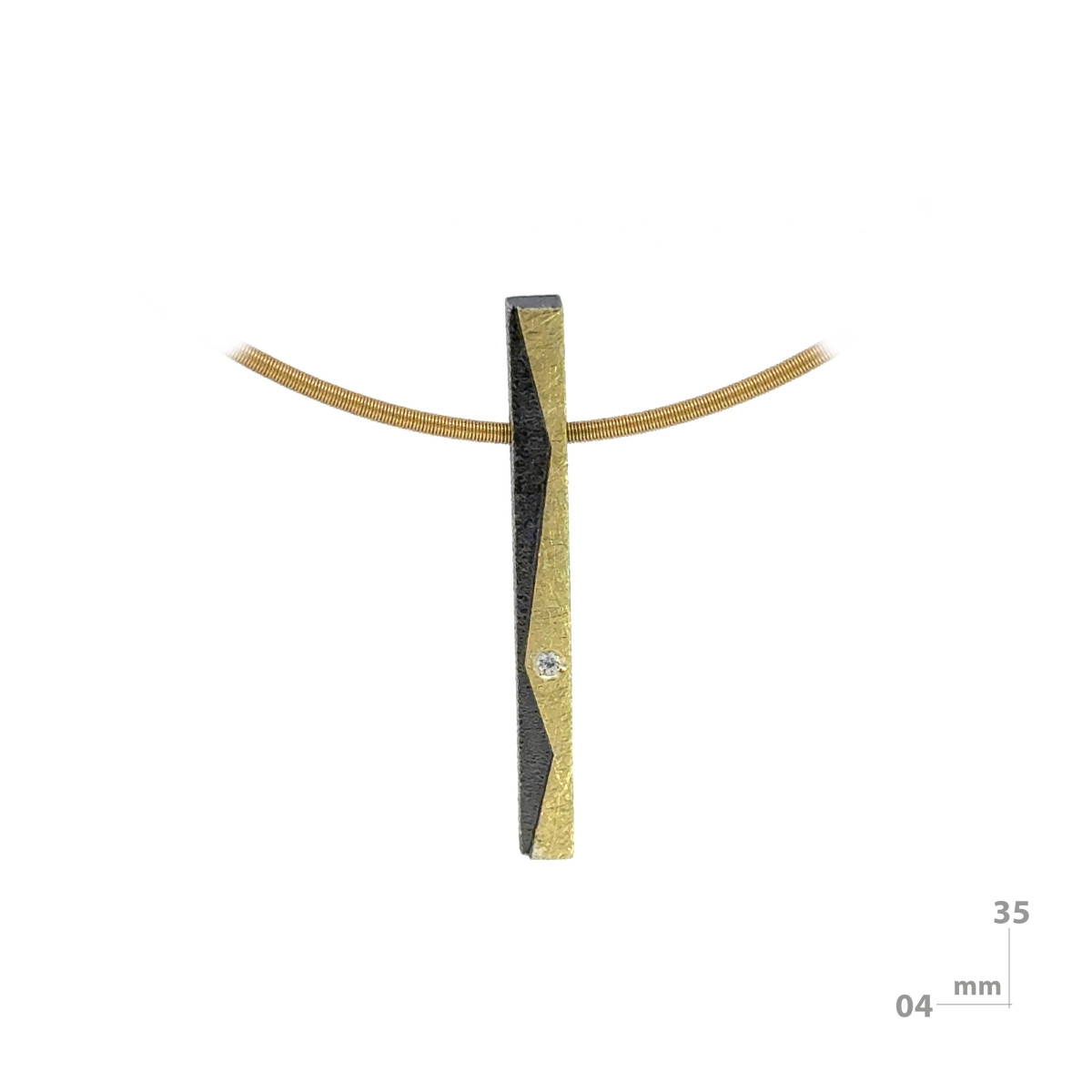 Silver, gold and diamond pendant