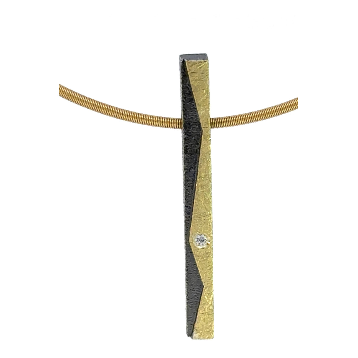 Silver, gold and diamond pendant