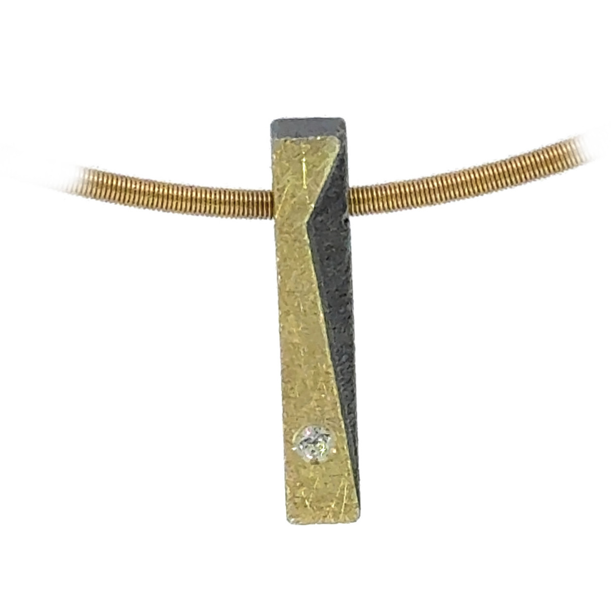 Silver, gold and diamond pendant