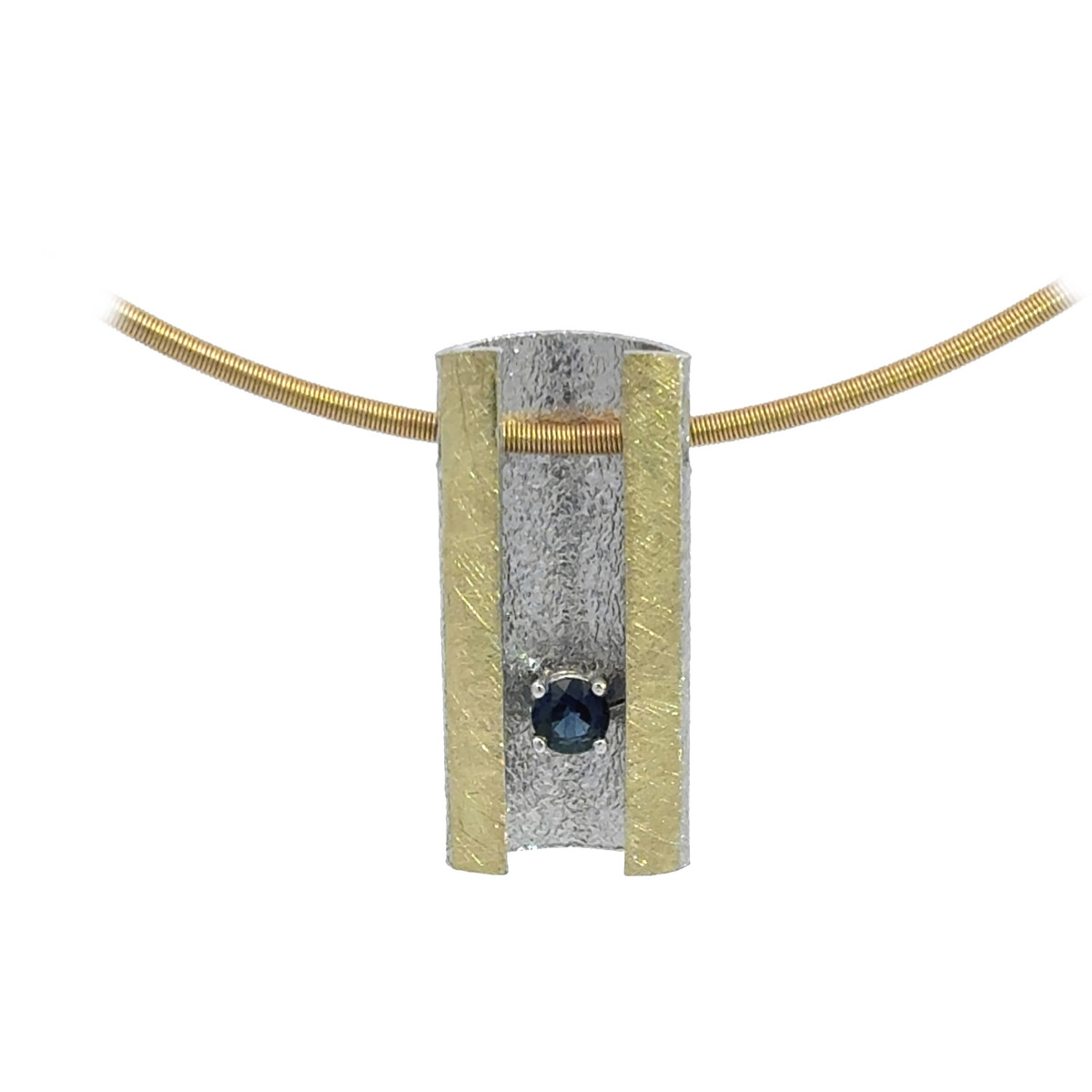 Silver, gold and sapphire pendant