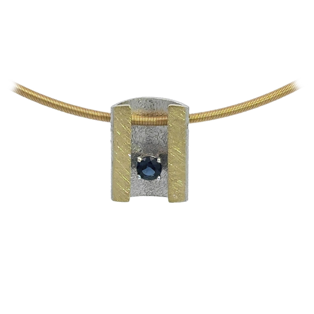 Silver, gold and sapphire pendant