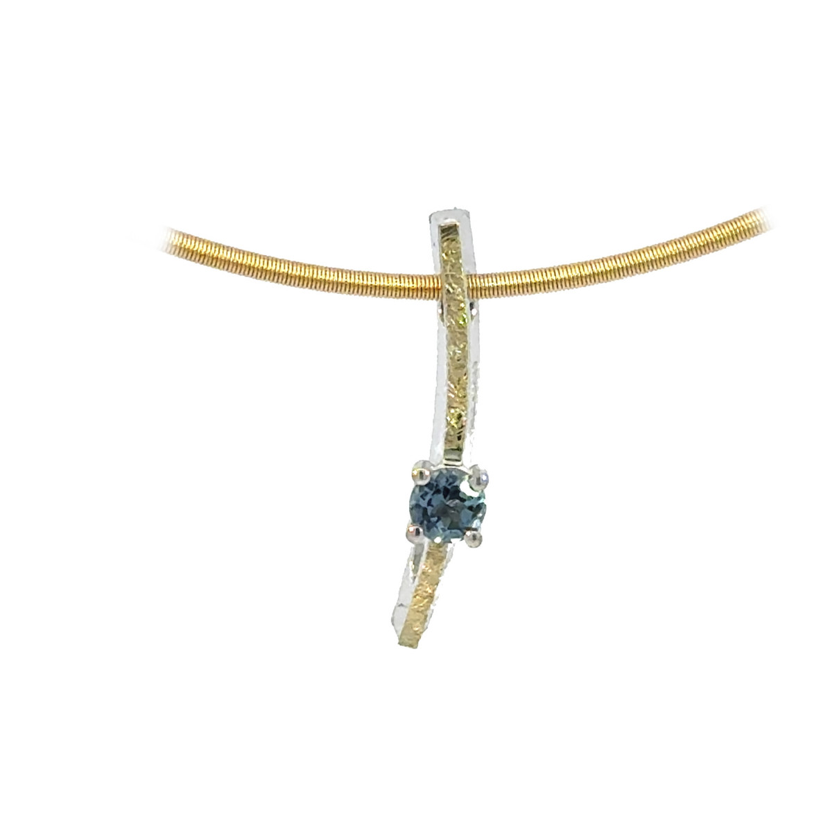 Silver, gold and topaz pendant