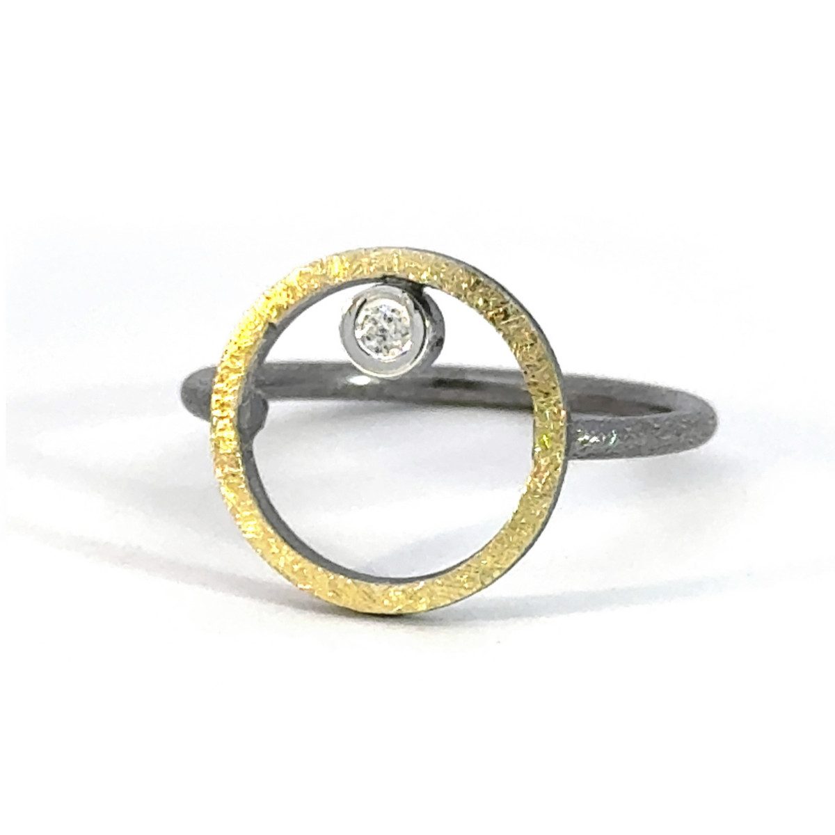 Silver, gold and diamond ring