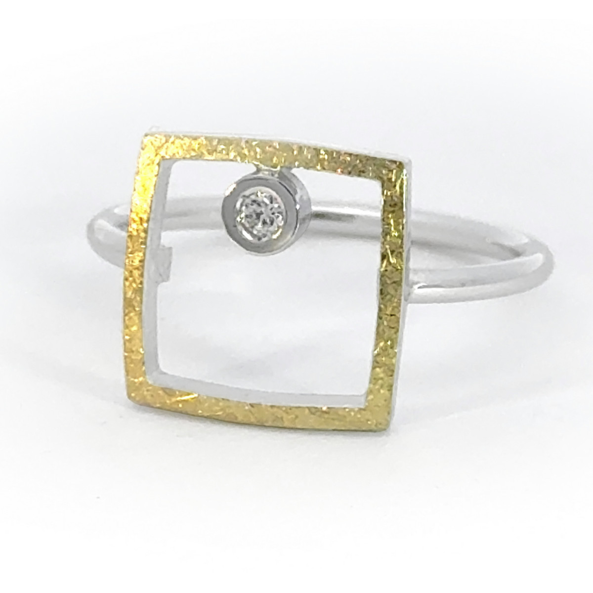 Silver, gold and diamond ring
