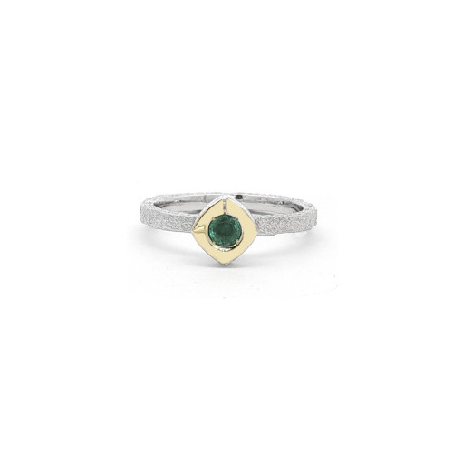 Silver, gold and emerald ring