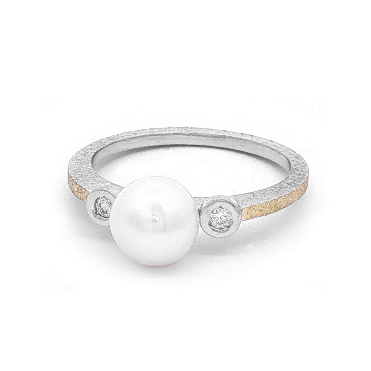Anell de plata, or, perla i brillant lab
