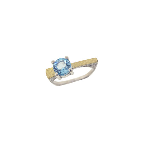 Silver, gold and blue topaz ring