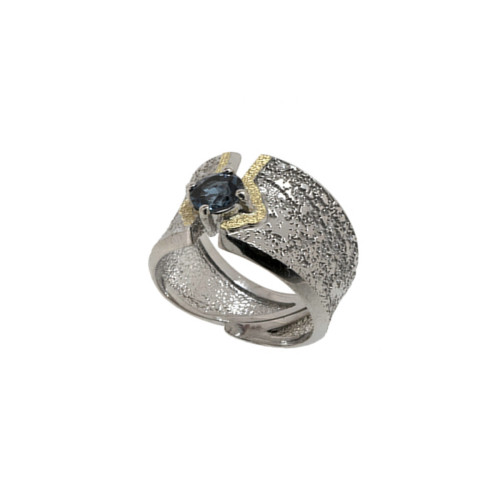 Silver, gold and topaz ring