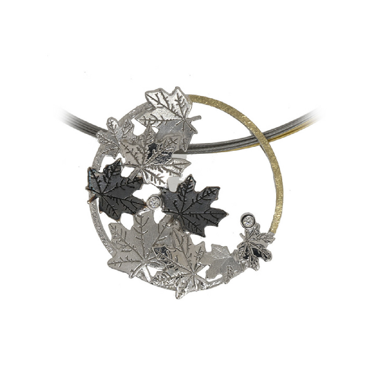 Colgante fabricado en plata, oro de 18k y brillante