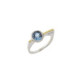 Silver, gold and blue topaz ring