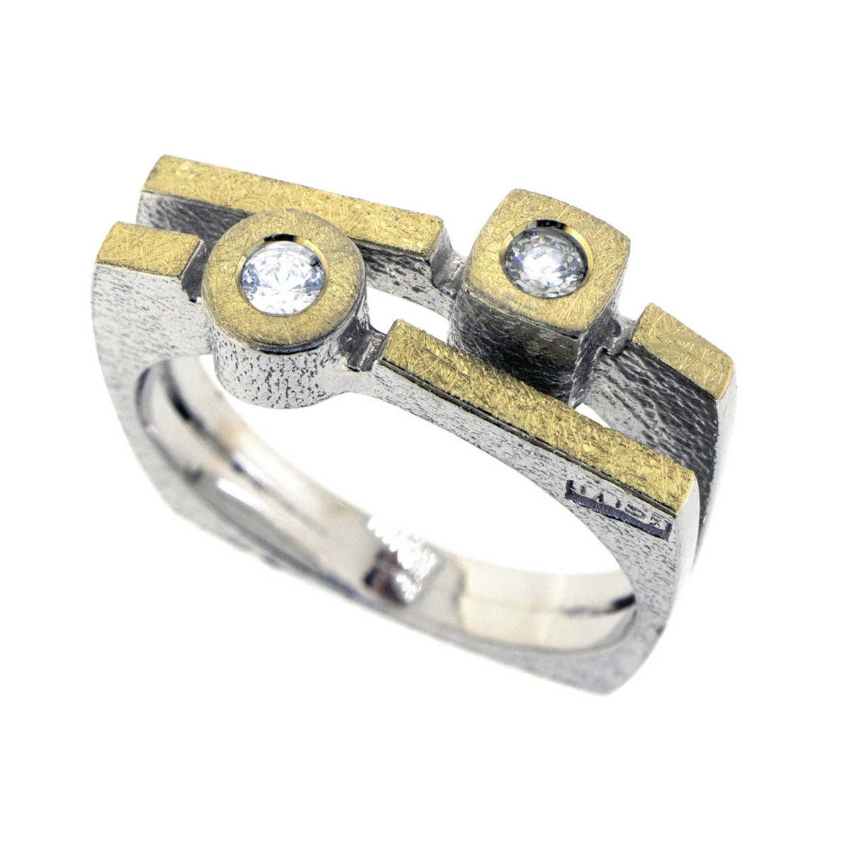 Silver, gold and brilliant ring