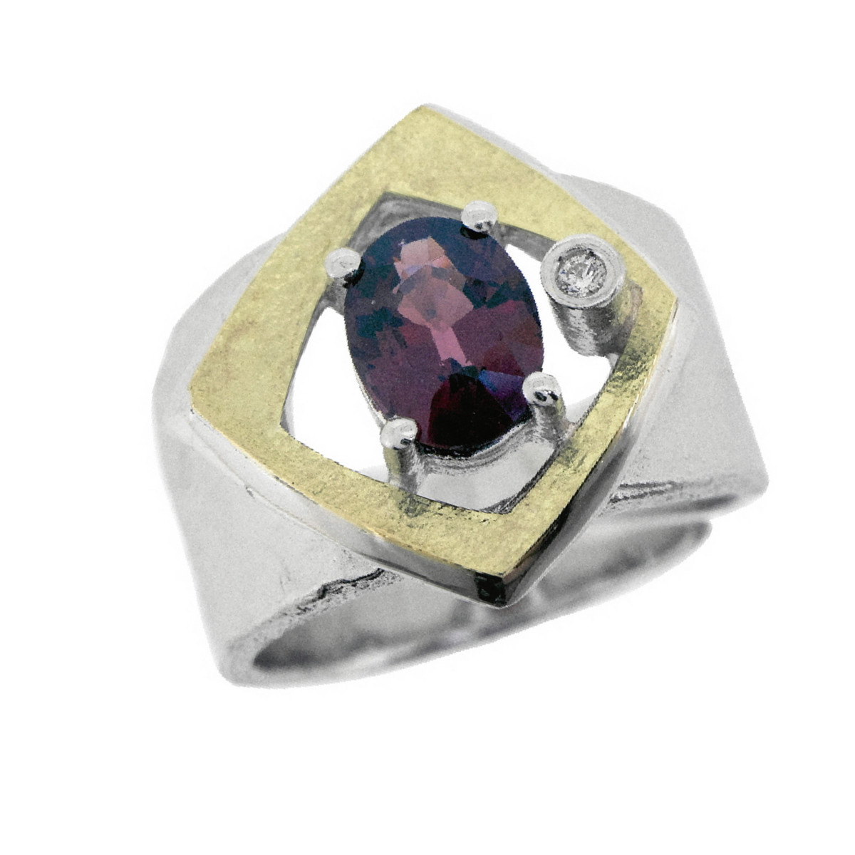 Anillo de plata, oro, rodolita y brillante de 0.015 ct