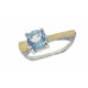 Silver, gold and blue topaz ring