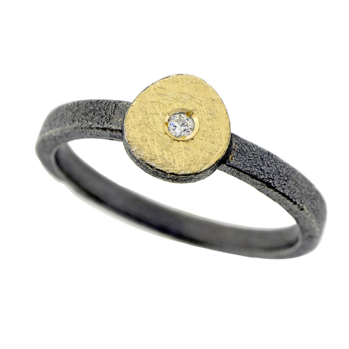 Anillo de plata oxidada, or y brillante