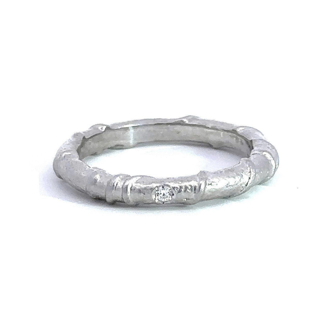 Silver and diamond ring
