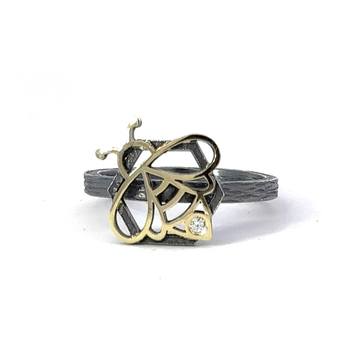 Anillo de plata, oro y brillante