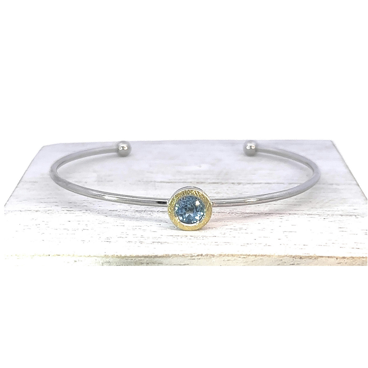 Pulsera de plata, oro y topacio