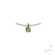 Silver, gold and peridot pendant