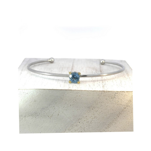 Polsera de plata, or i topaci