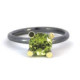 Silver, gold and peridot ring