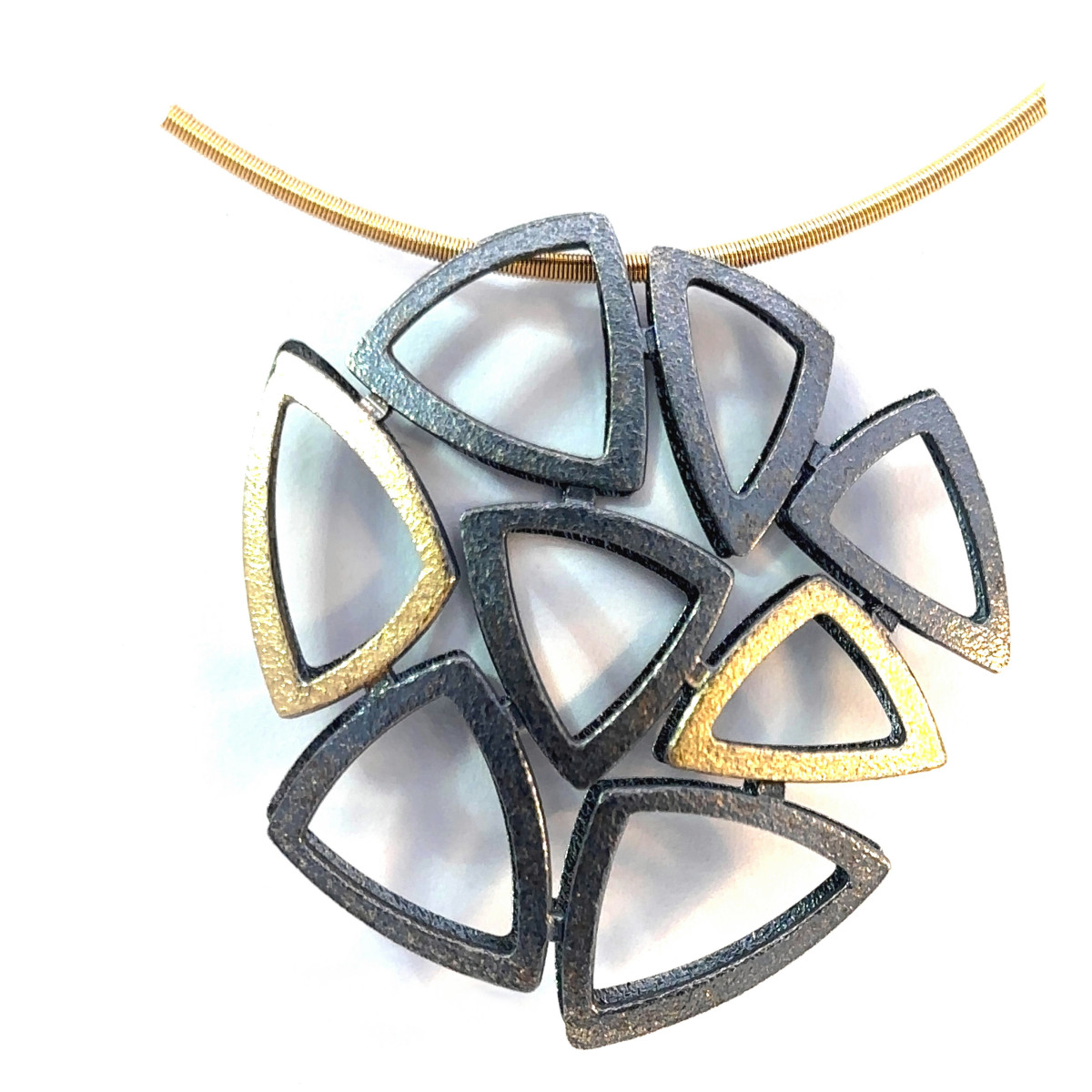 Colgante de plata y oro