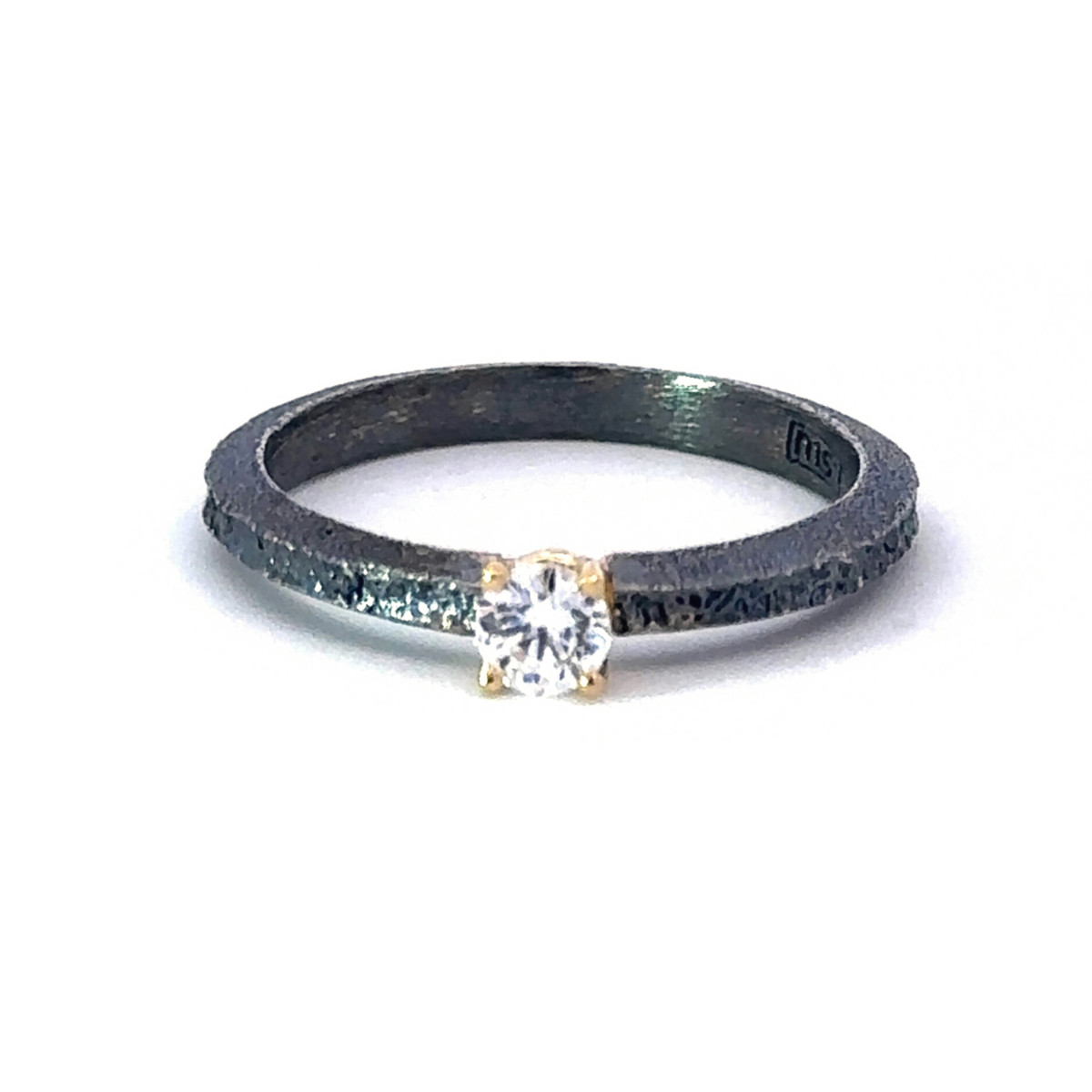 Silver, gold and brilliant ring