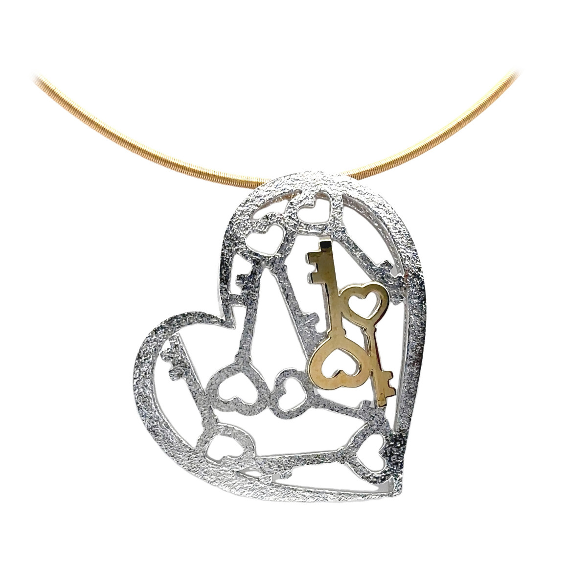 Colgante de plata y oro