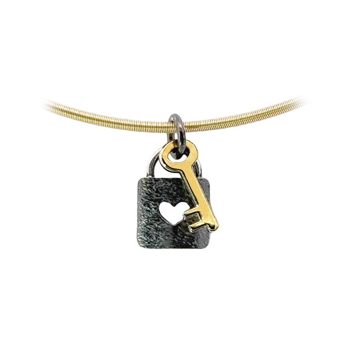 Colgante de plata y oro