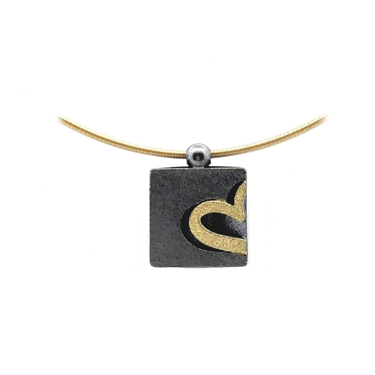 Colgante de plata y oro